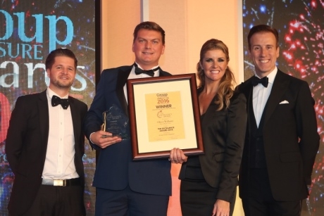 Ben Delahunty from Group Line and Anton Du Beke and Erin Boag presenting the Excellence Award to Oliver Williams from Isle of Wight Tours last October.